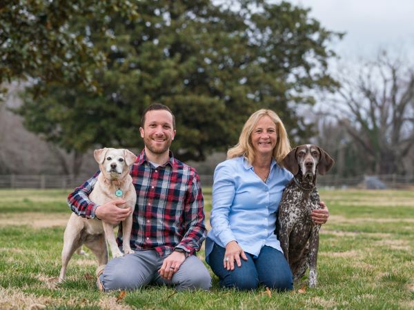 Pictured are Dr. Andrew Moyer, along with his canine companion, Ellie, and Dr. Laura Buscher, and her pride and joy, Rebel.